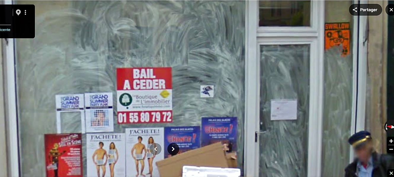 Panneau « Bail à céder » en vitrine, 64 rue Montmartre